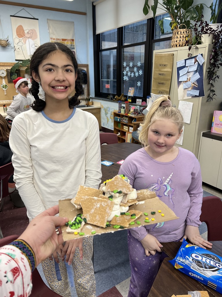 Before leaving for holiday break kid wind club fifth graders made on shore and off shore wind turbine hunger bread houses. They were all winners because they got to eat their masterpieces. 